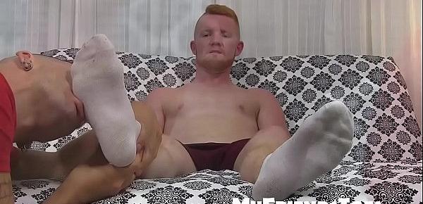  Gorgeous young hunky deviant has his cute feet worshipped
